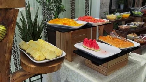 Sliced fresh fruit platter at breakfast buffet Stock Footage 336643807