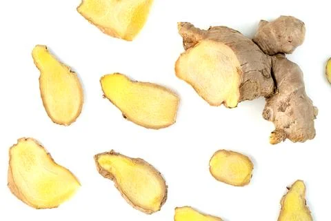 Sliced fresh ginger root isolated on white background Stock Photos