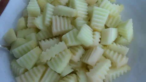 Sliced Fresh Melon in a Bowl Stock Footage 333025700