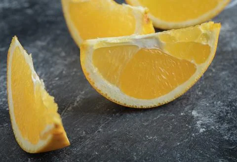Sliced fresh orange on marble background Stock Photos