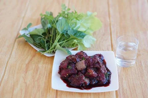 Sliced fresh raw beef to small pieces, mixed with Thai herbs Stock Photos