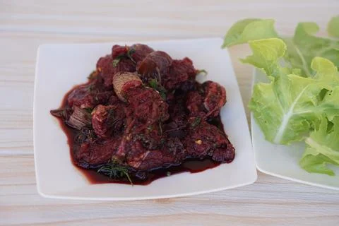 Sliced fresh raw beef to small pieces, mixed with Thai herbs Stock Photos