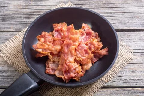 Sliced fried bacon Stock Photos