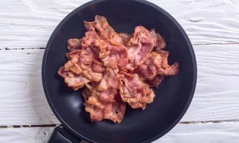 Sliced fried bacon Stock Photos