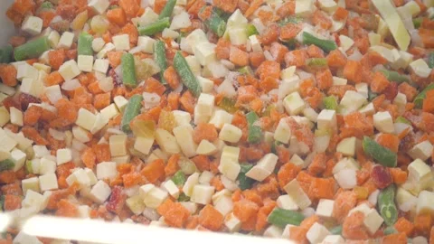 Sliced frozen vegetables close-up 스톡 동영상 264802404