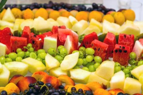 Sliced fruit on the buffet table. Healthy food and tasty fruit Foto stock