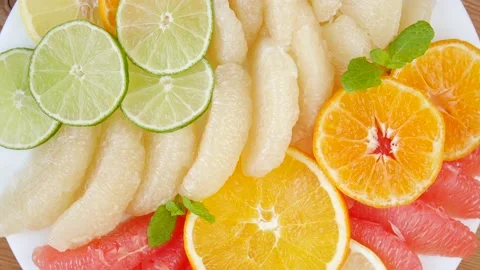 Sliced fruit on a plate. Stock Footage 238889539