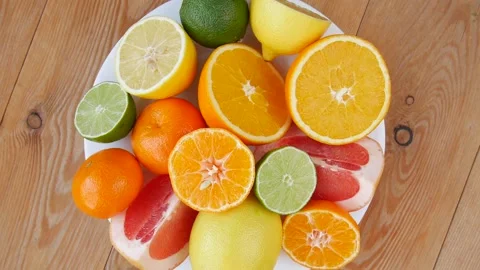 Sliced fruit on a plate. Stock Footage 240078643