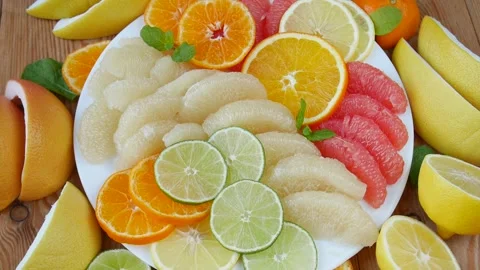 Sliced fruit on a plate. Stock Footage 240275651