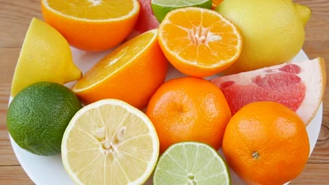 Sliced fruit on a plate. Stock Footage 240275902