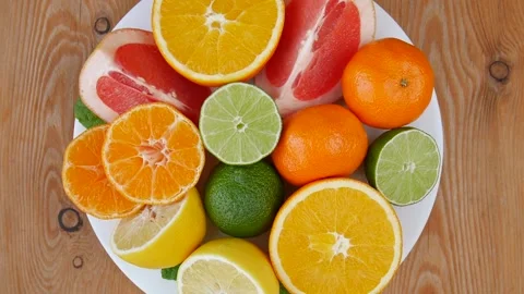 Sliced fruit on a plate. Stock Footage 241909245