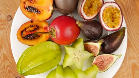 Sliced fruit on a plate. Stock Footage 245681987