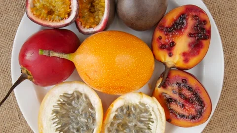 Sliced fruit on a plate. Stock Footage 248081889