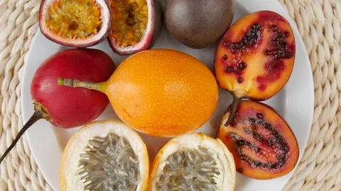 Sliced fruit on a plate. Video stock 301860574