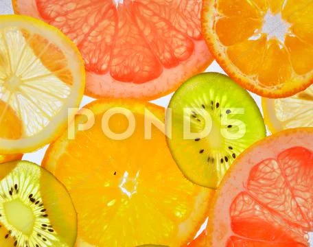 Sliced fruits Stock Photos