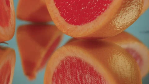 Sliced ​​grapefruit slices on a turntable. Close-up of grapefruit details. Stock Footage 171545265