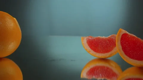 Sliced ​​grapefruit on the table Stock Footage 171584783