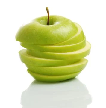 Sliced green apple Stock Photos