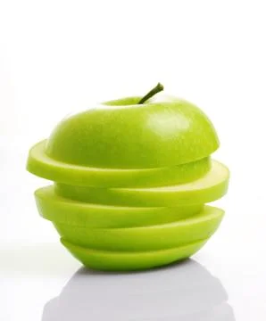 Sliced green apple Stock Photos
