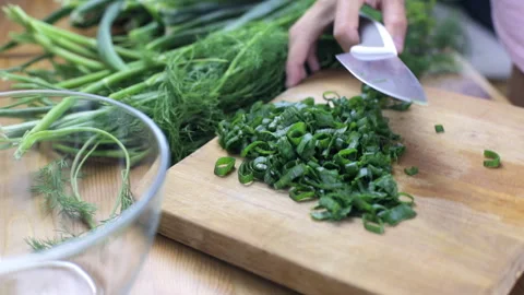 Sliced greenery add to the salad Stock-Footage 94477168