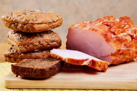 The sliced ham and bread slices Stock Photos