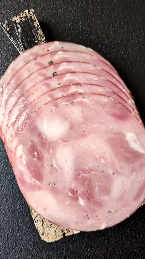 Sliced ham, meat, pork or turkey sausage for sandwiches. Ham slices, food Video stock 313452607