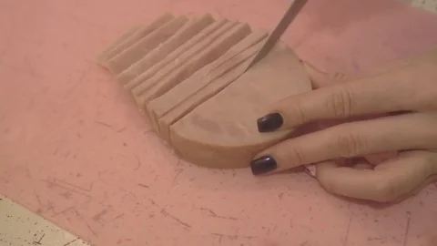 Sliced Ham on a Pink Board Stock Footage 74155150