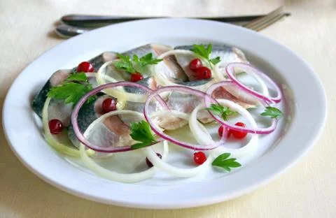 Sliced herring Stock Photos