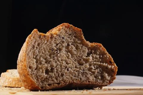 Sliced home made bread on a table Stock Photos