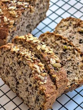 Sliced Keto Bread Loaf Displaying Dense Seeded Crumb Stockfoto's
