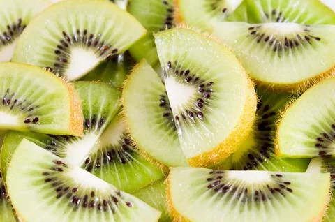 Sliced  kiwi background Stock Photos