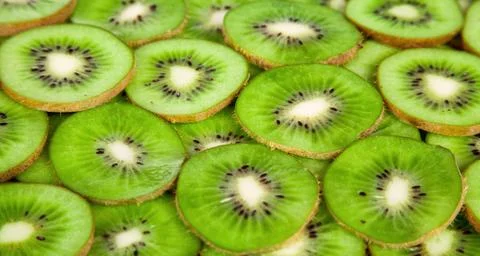Sliced Kiwi as Background Stock Photos