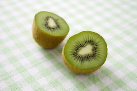 Sliced kiwi fruit Stock Photos