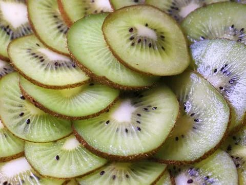 Sliced kiwi fruit Stock Photos