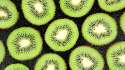 Sliced Kiwi fruit top view, rotation. 4K UHD video Stock-Footage 164705796