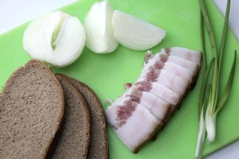 Sliced lard, onion, bread Stock Photos