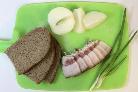 Sliced lard, onion, bread Stock Photos