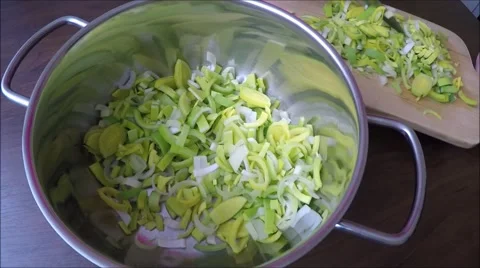 Sliced leek in the pot Stock Footage 45980688