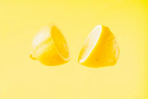 Sliced lemon floating Stock Photos