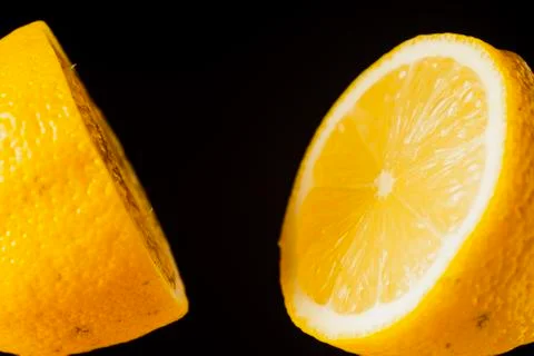 Sliced lemon floating Stock Photos