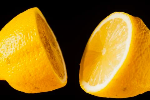 Sliced lemon floating Stock Photos