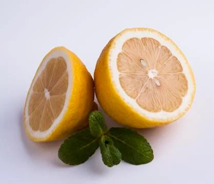 Sliced lemon with mint Stock Photos
