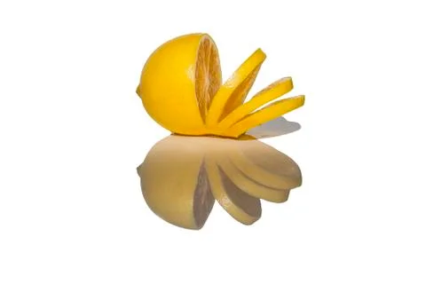 Sliced lemon reflected from surface Stock Photos