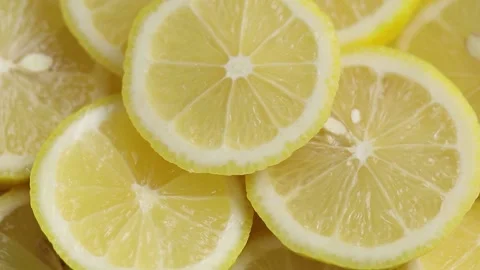 Sliced ​​lemons on a rotating tray Stock Footage 171160454