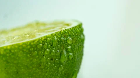 Sliced lime macro Stock Photos