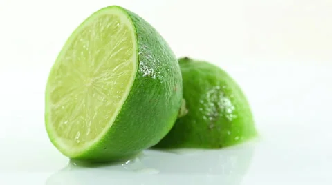 Sliced Limes Rotating on White Background Stock-Footage 39376374