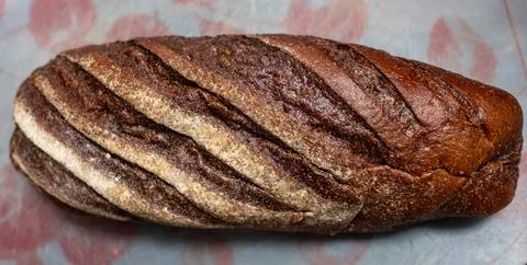 Sliced loaf of rye bread. Shooting from above in daylight Stock Photos