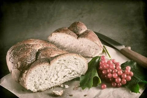 Sliced loaf of white bread on the table On the table is a sliced loaf of w... Stock Photos