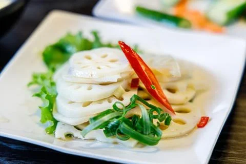 Sliced Lotus Root with Spring Onion and Chilli Stock Photos