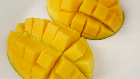 Sliced mango on a plate. Stock Footage 234010728